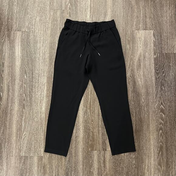 EUC Lululemon On the Fly 7/8 Pant Stretch High-Rise Black Sz 6 Minimalist Jogger - Picture 13 of 16